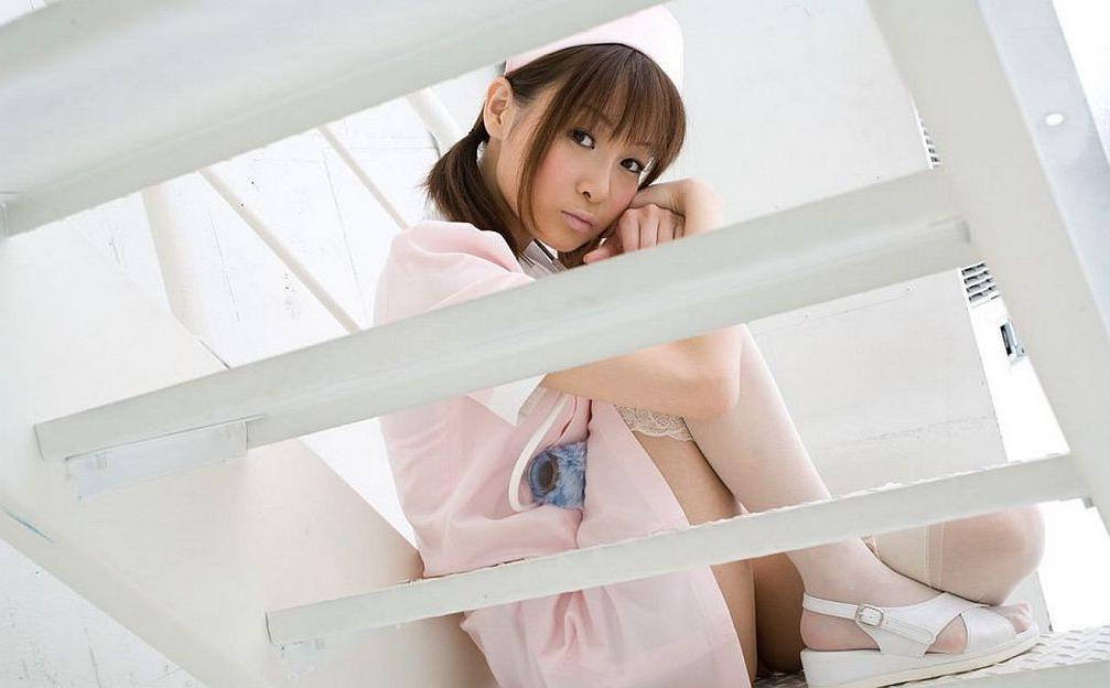 15P Pretty asian nurse Misa Kikouden posing shows tits