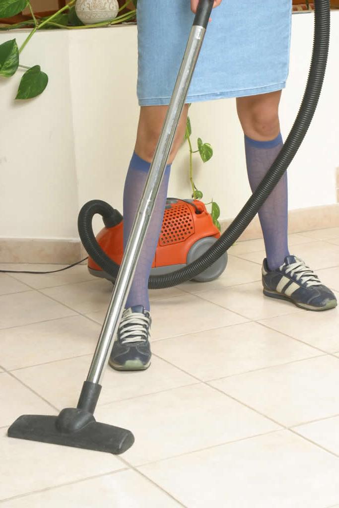 18P Amateur teen maid strips while cleaning the house