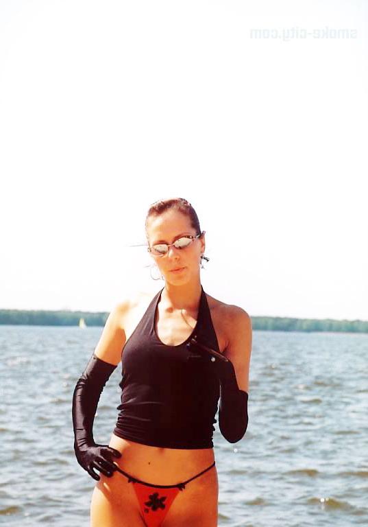 15P Sexy teen attractive smoking on the beach
