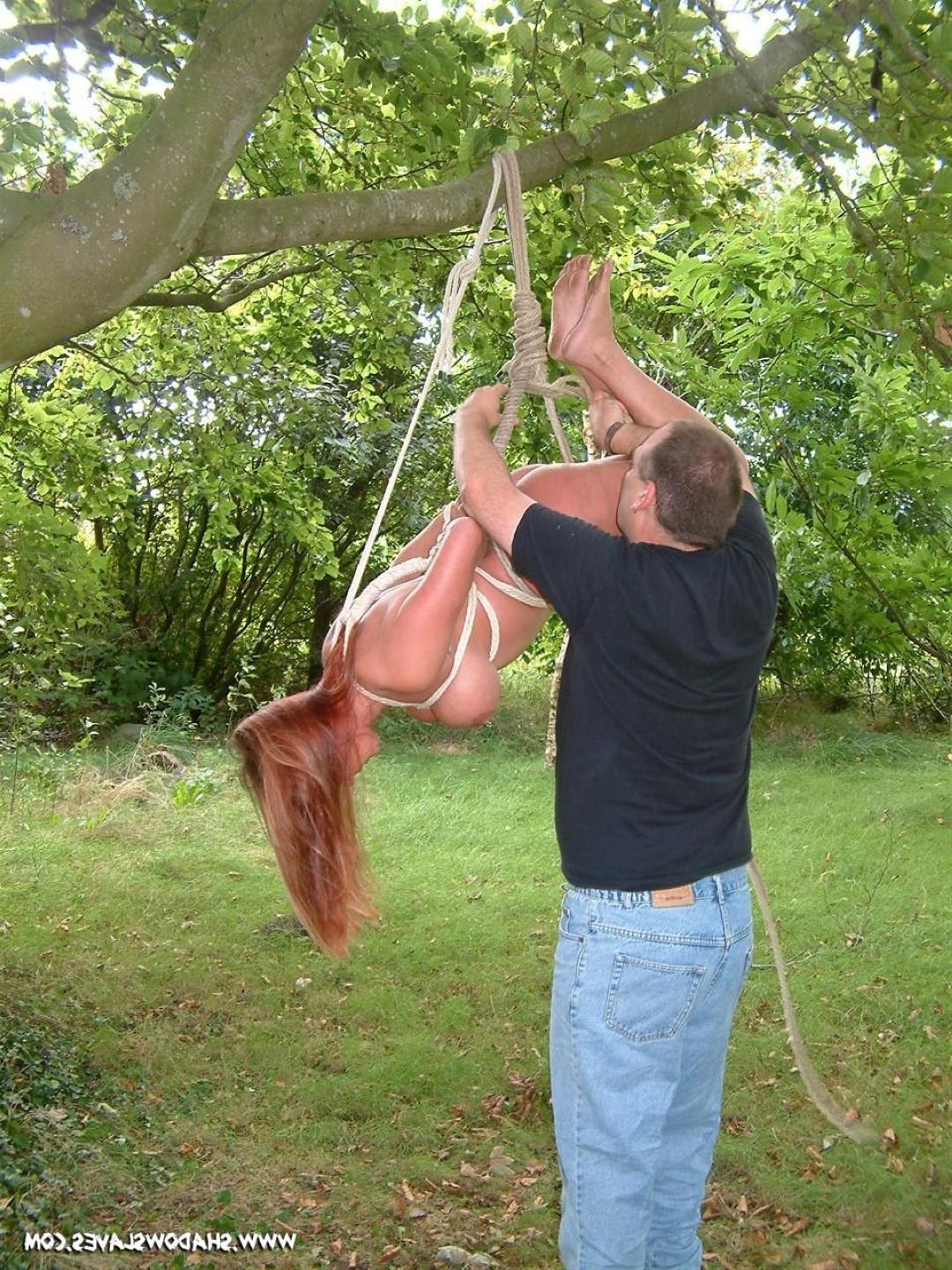 16P Amateur MiLF is bound and suspended from a tree