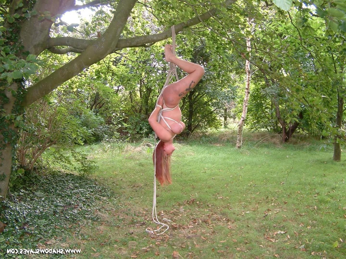 16P Amateur MiLF is bound and suspended from a tree