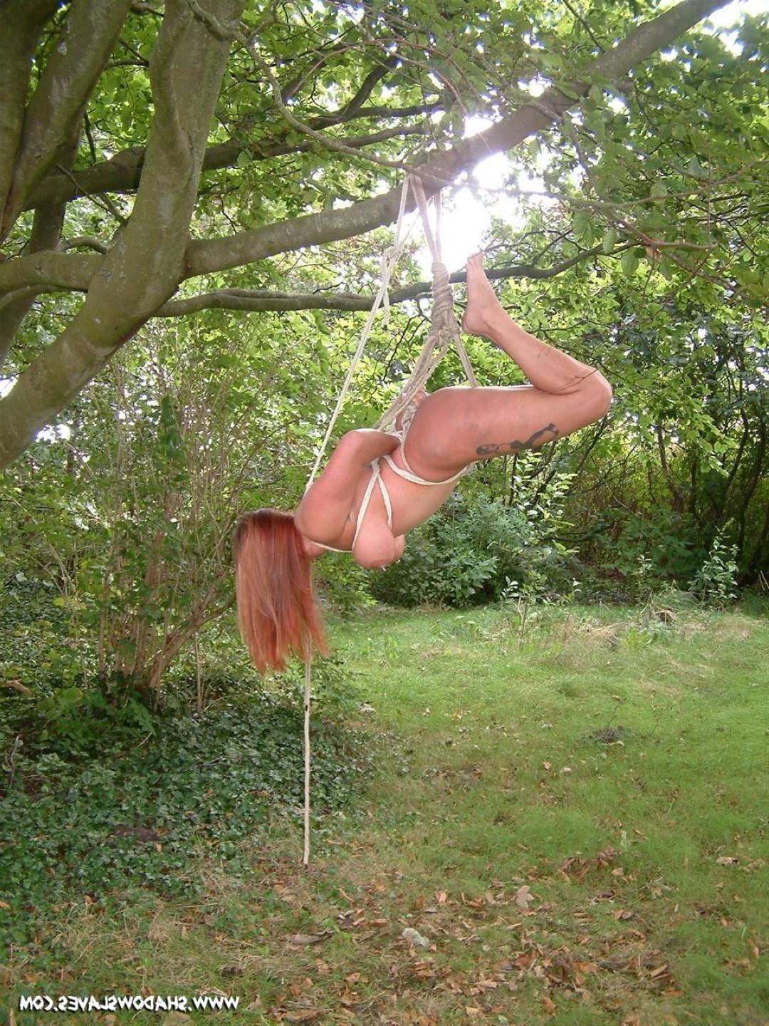 16P Amateur MiLF is bound and suspended from a tree