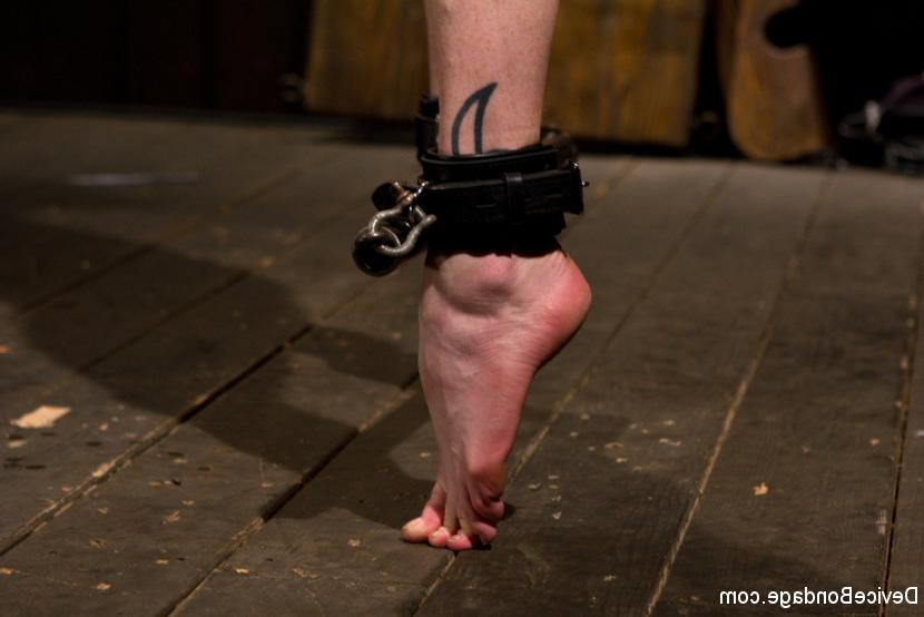 15P Scarlet Faux is whipped in bondage her naked body clamped