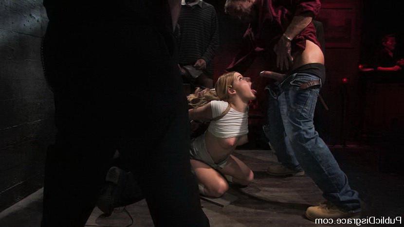 15P Nasty girl in bondage sucking pricks and fucked in wild orgy