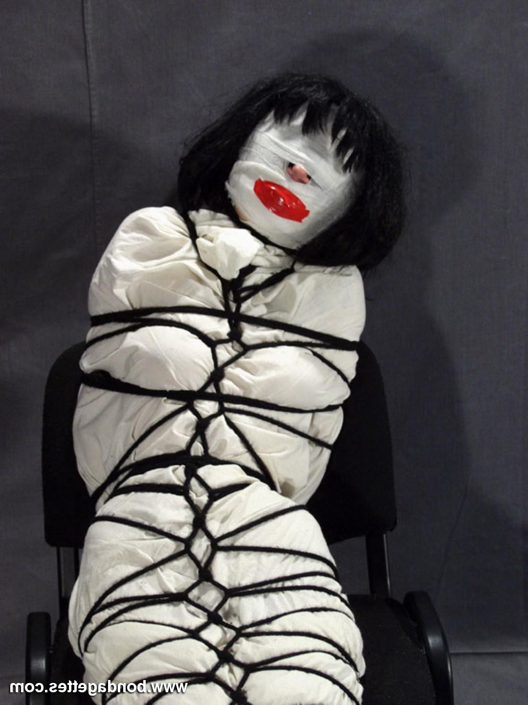 16P Creepy mummification bondage of yummy brunette