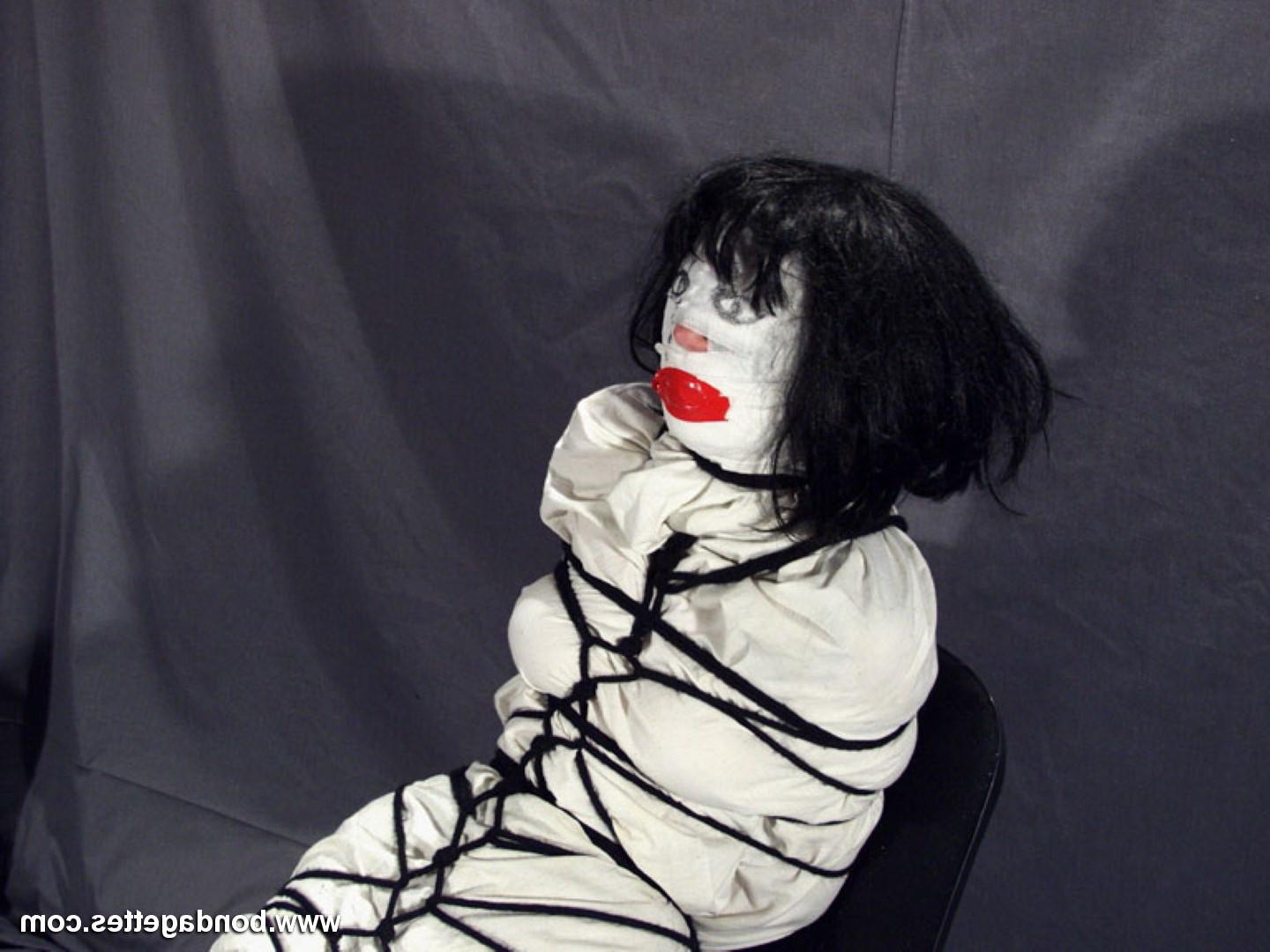 16P Creepy mummification bondage of yummy brunette