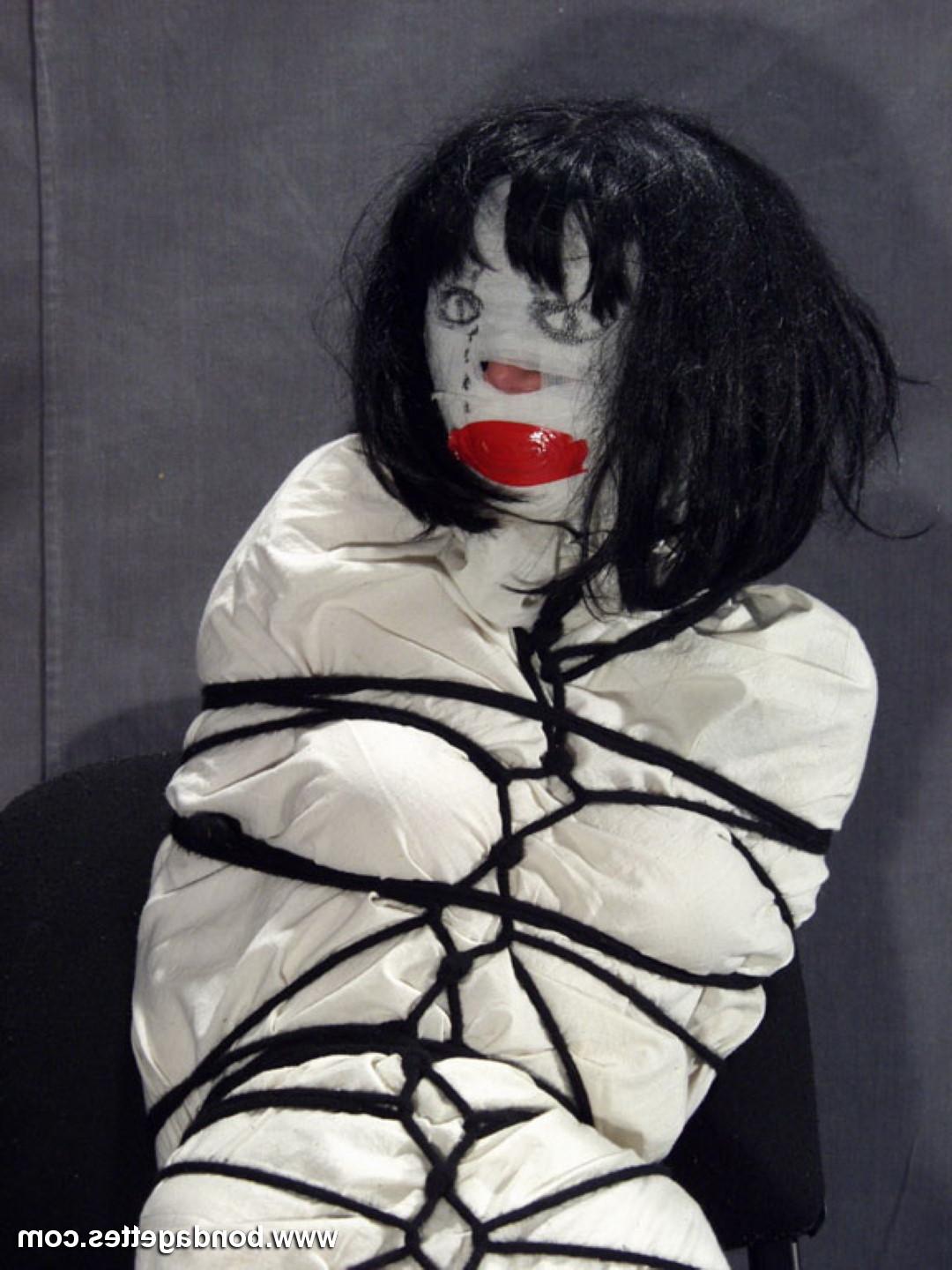 16P Creepy mummification bondage of yummy brunette