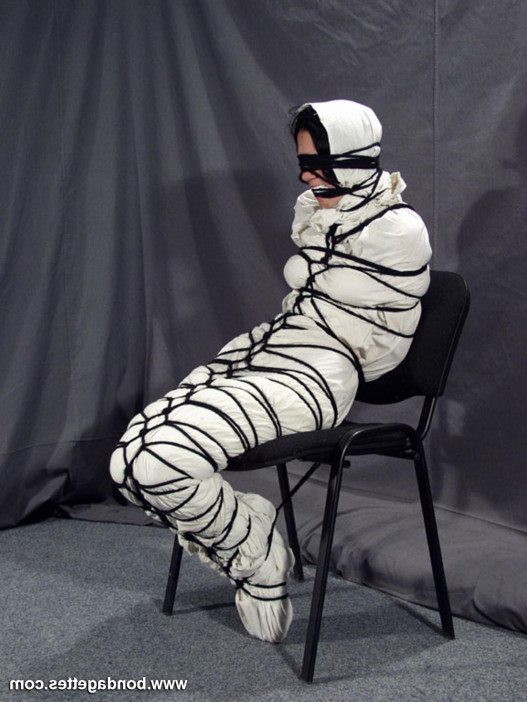 16P Creepy mummification bondage of yummy brunette