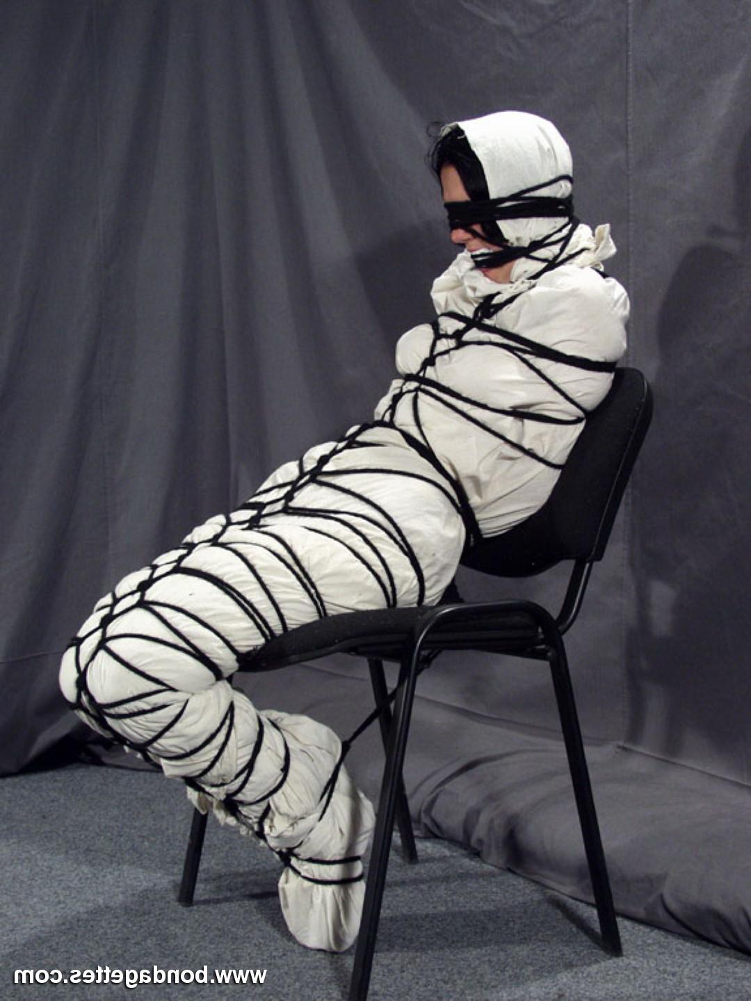 16P Creepy mummification bondage of yummy brunette