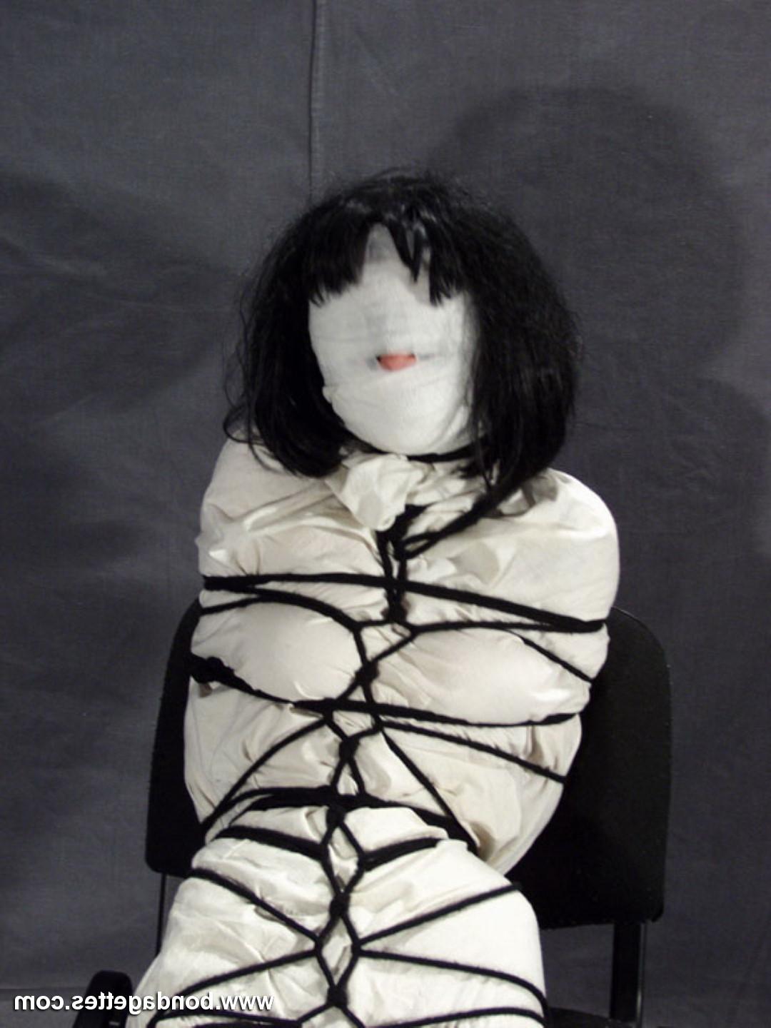 16P Creepy mummification bondage of yummy brunette