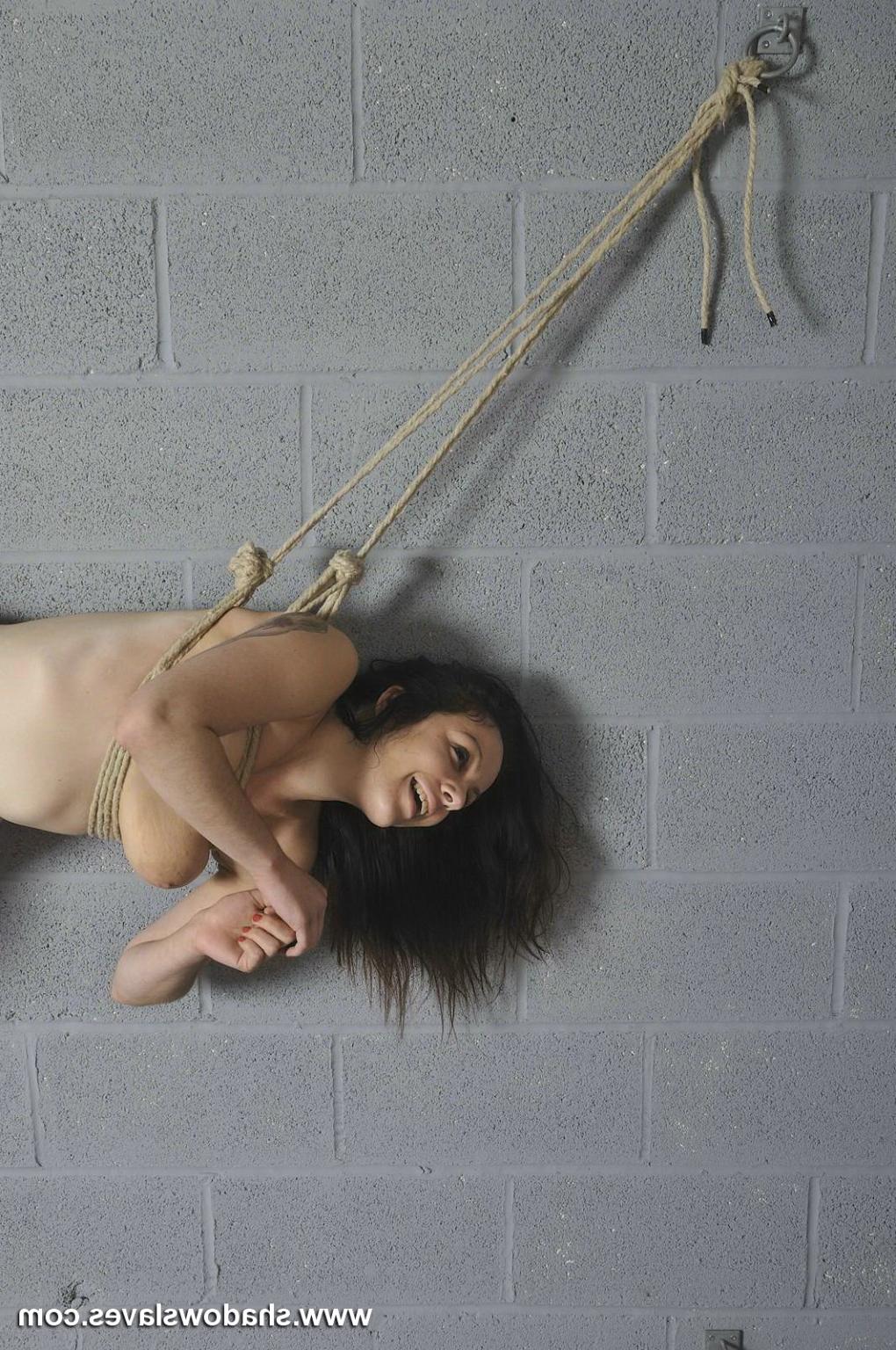 16P Beauvoir in strict rope bondage bound to a wall