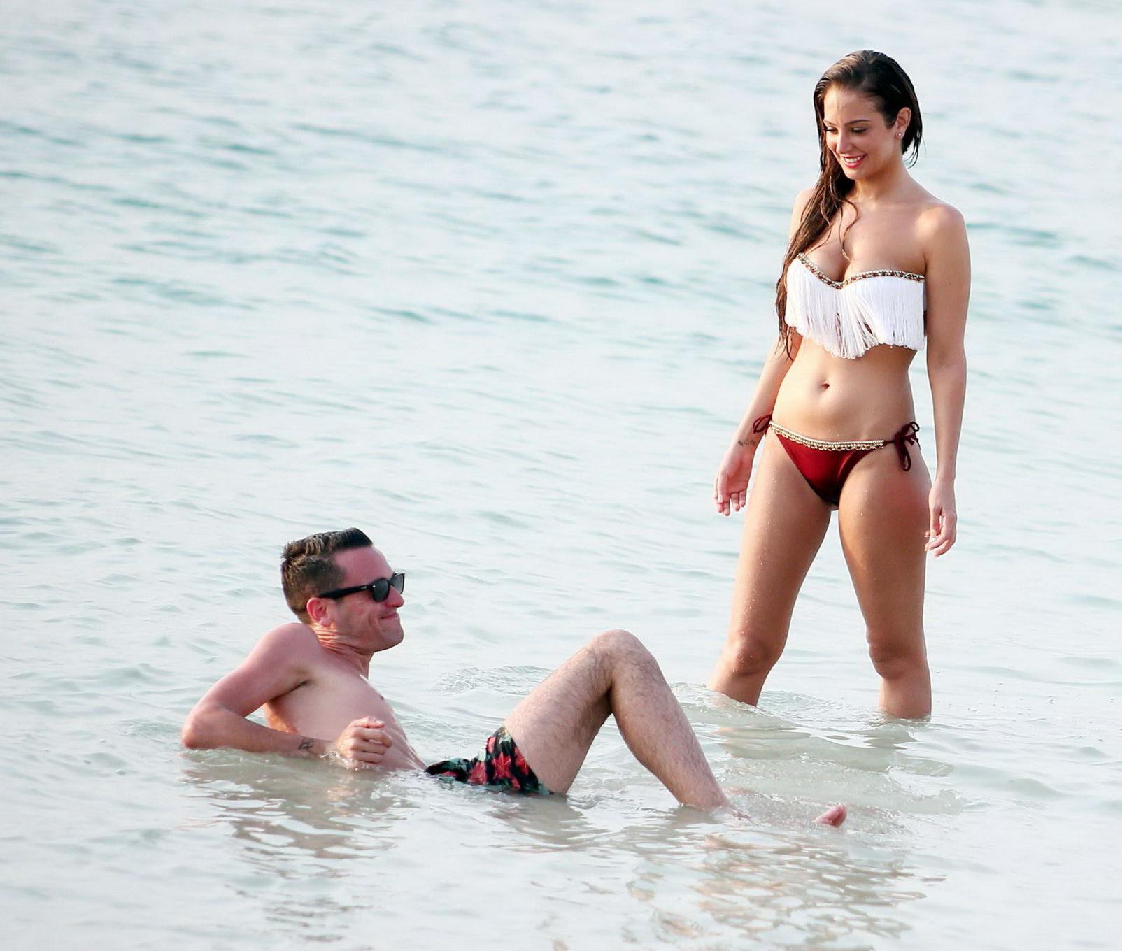 16P Tulisa Contostavlos showing off her perfect bikini body at the beach in Dubai