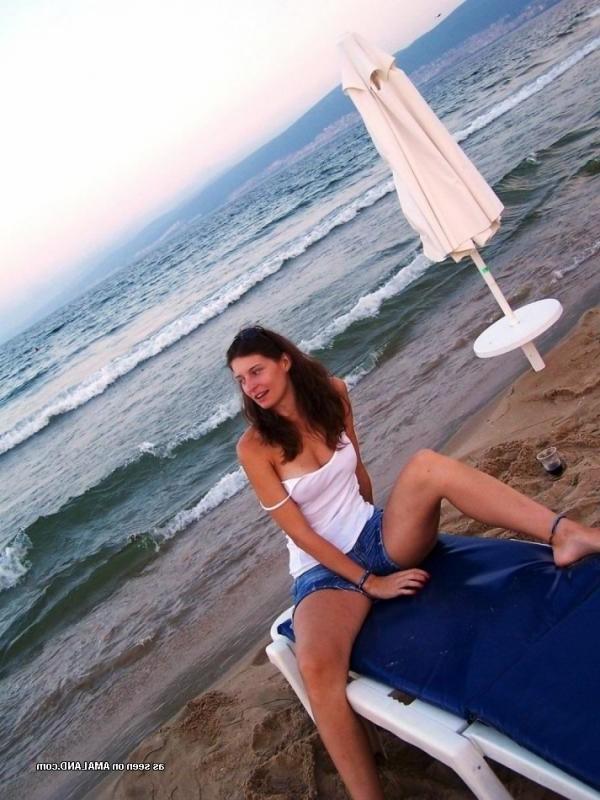 15P Kinky amateur MILF teasing her lover by the beach