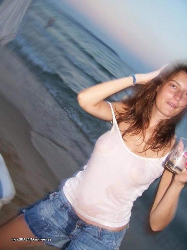 15P Kinky amateur MILF teasing her lover by the beach