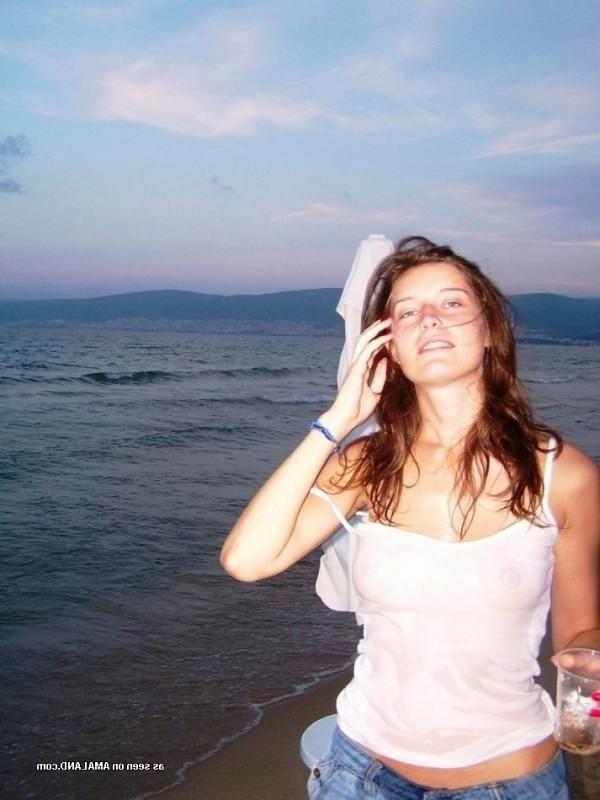 15P Kinky amateur MILF teasing her lover by the beach