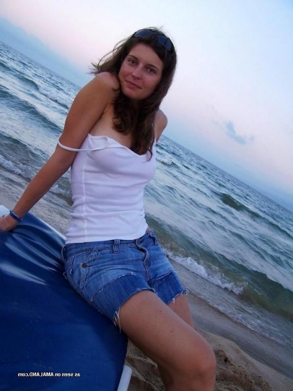 15P Kinky amateur MILF teasing her lover by the beach