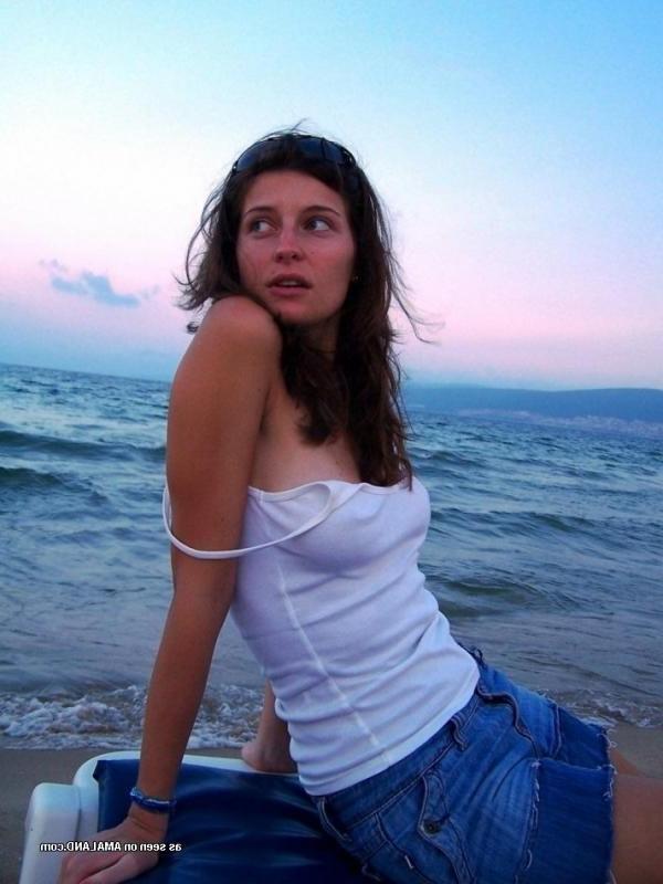 15P Kinky amateur MILF teasing her lover by the beach