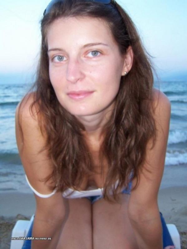 15P Kinky amateur MILF teasing her lover by the beach