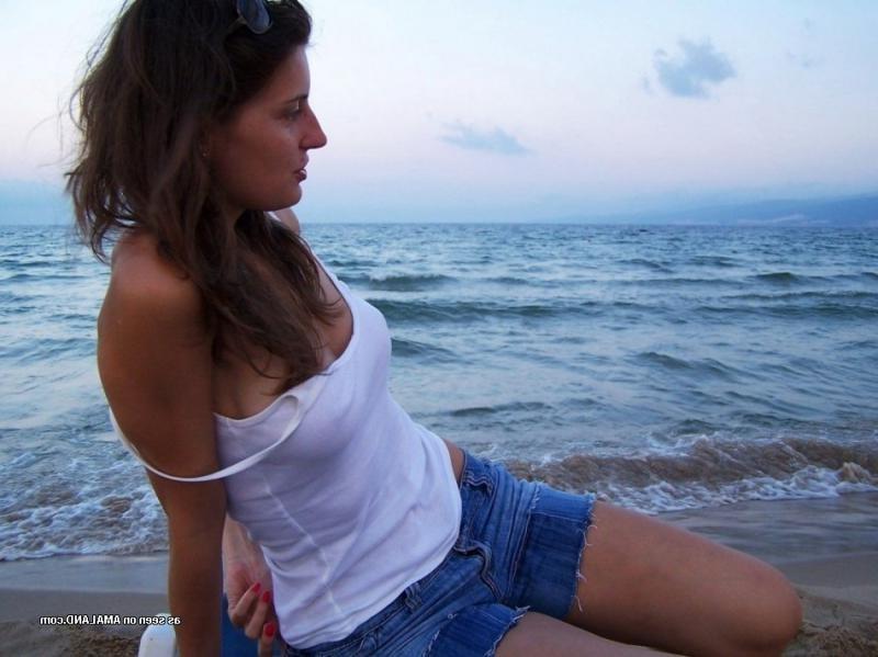 15P Kinky amateur MILF teasing her lover by the beach