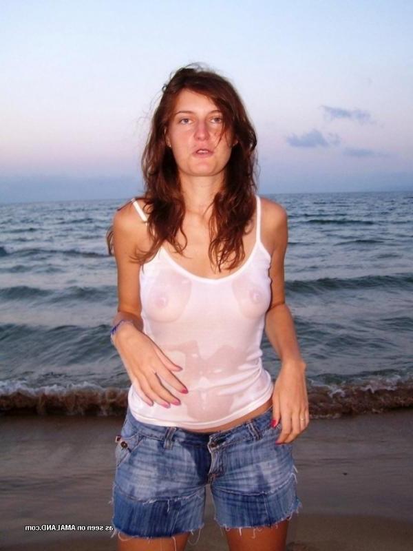 15P Kinky amateur MILF teasing her lover by the beach