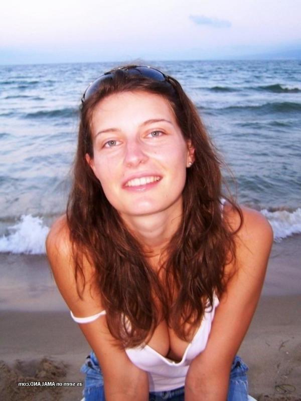 15P Kinky amateur MILF teasing her lover by the beach