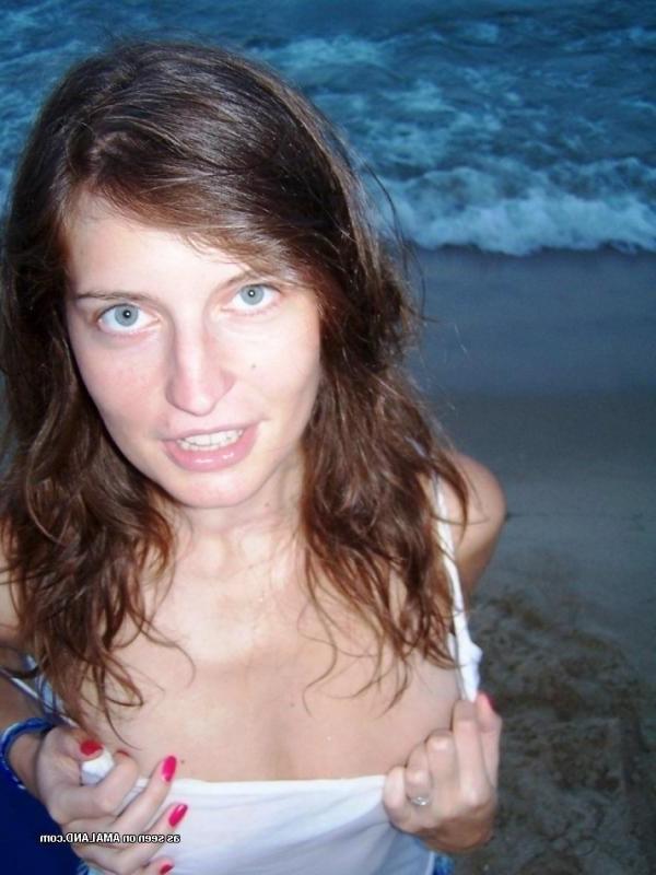 15P Kinky amateur MILF teasing her lover by the beach