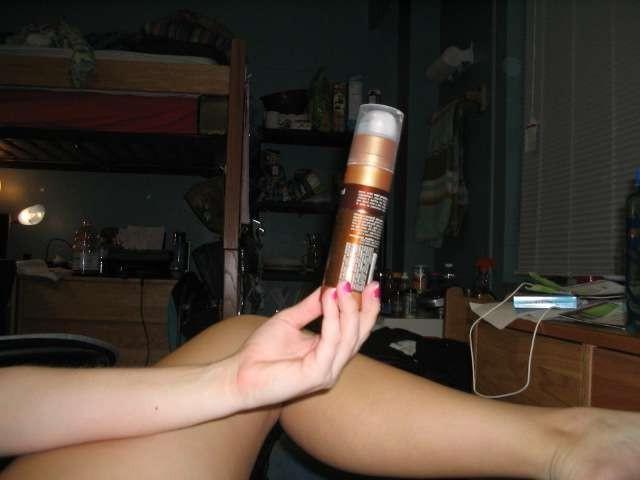 18P Amateur teen girl inserts can into pussy