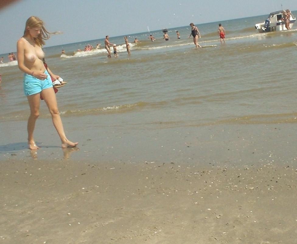 15P Busty brunette teen stripping naked and playing with tits
