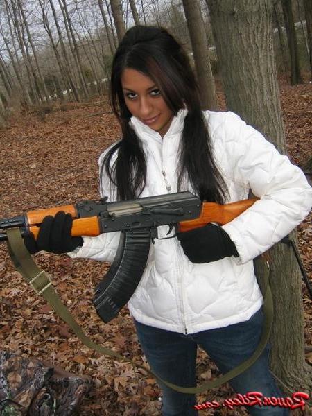 16P Amateur teen babe with a gun outside