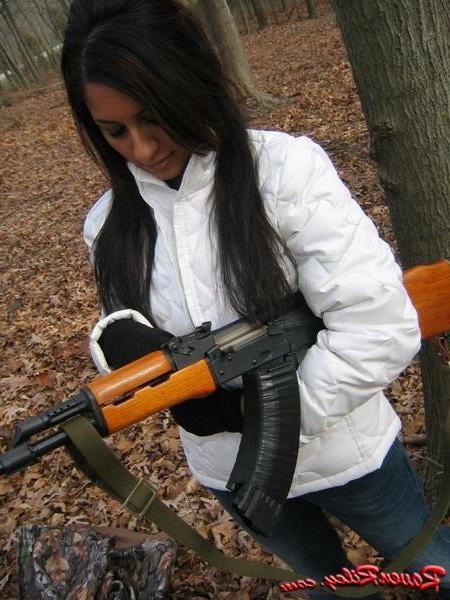 16P Amateur teen babe with a gun outside