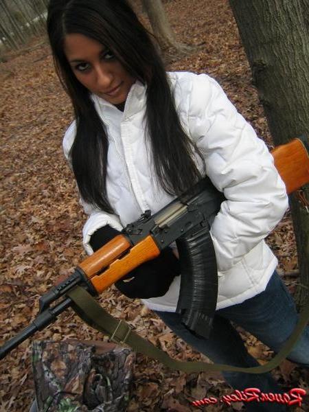 16P Amateur teen babe with a gun outside
