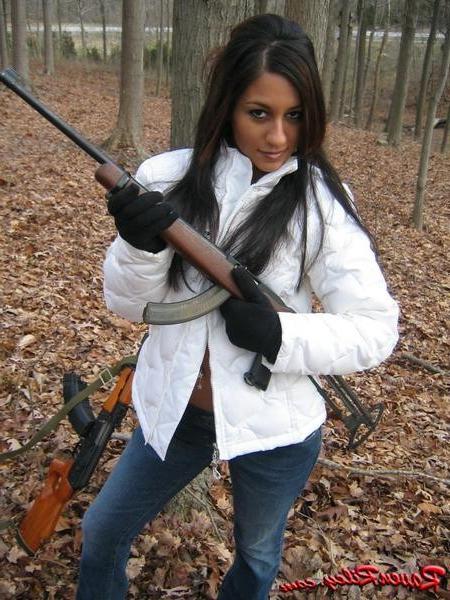 16P Amateur teen babe with a gun outside