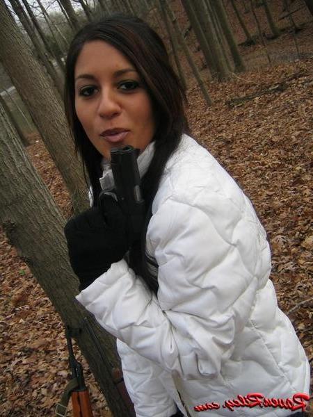 16P Amateur teen babe with a gun outside