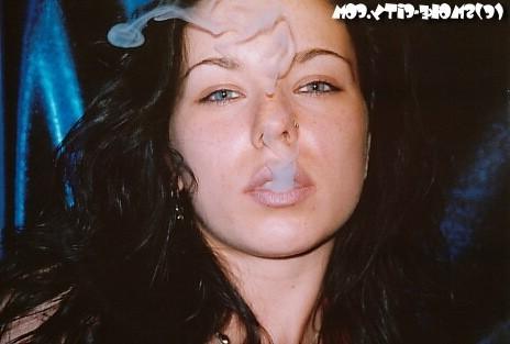 16P Amateur teen smoking on the bed