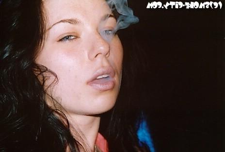 16P Amateur teen smoking a cigar