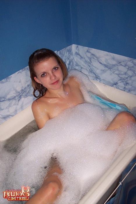 16P Check out this teen's ultra perky firm tits