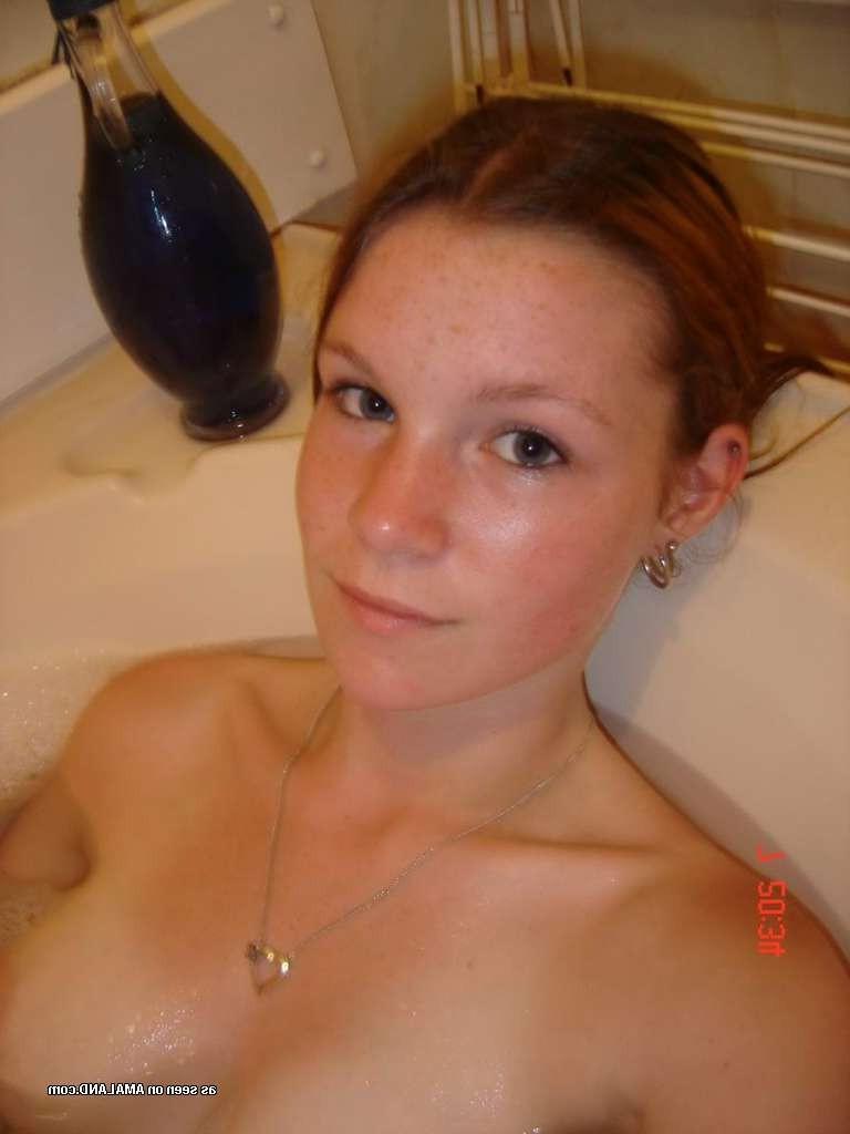 15P Cute amateur teen girlfriend spreads in bathroom and toys pussy