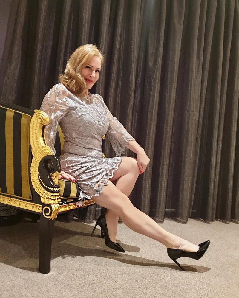 25P Mature, Old, Business Woman in Nylons