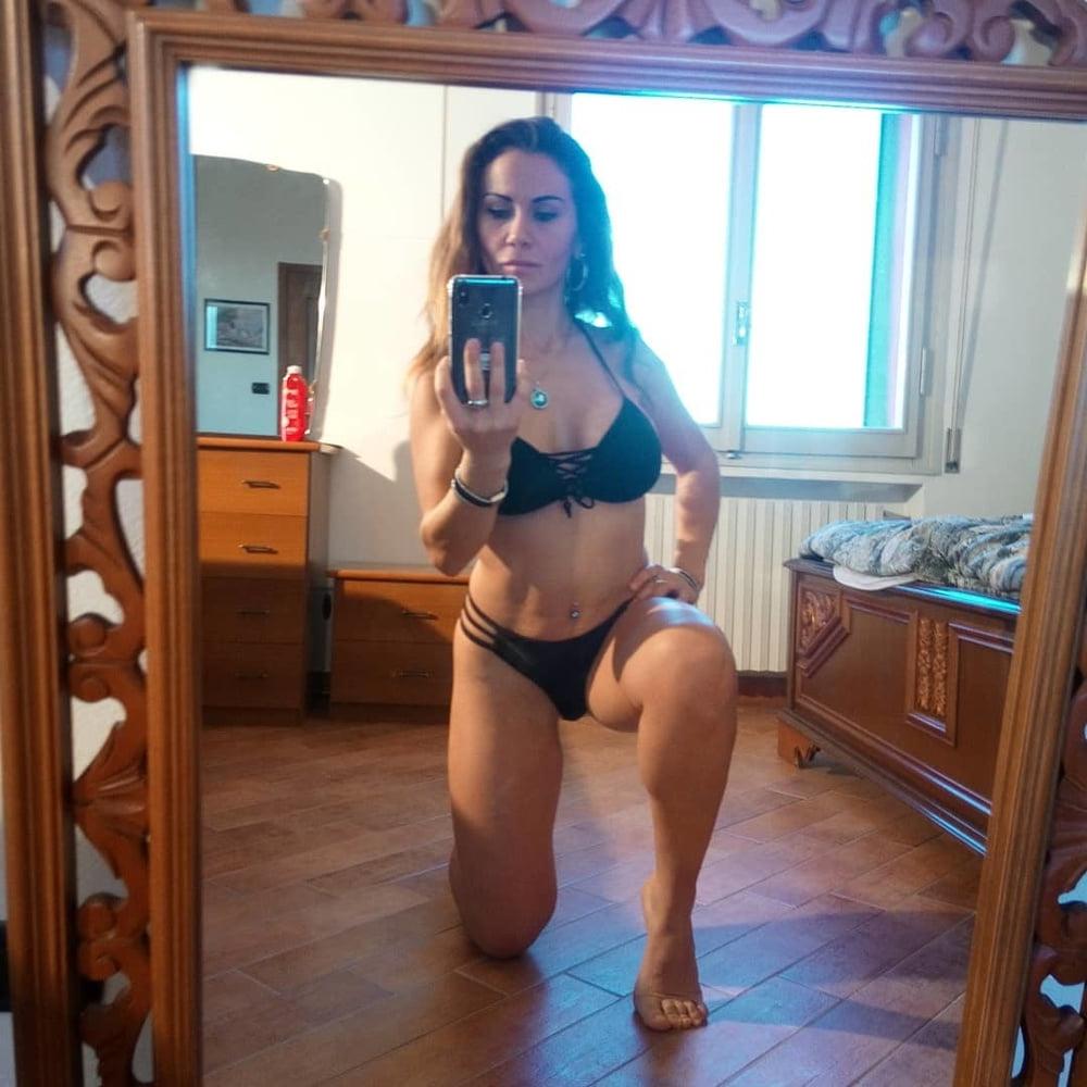 25P Hot anal slut showing her sexy outfits with stockings