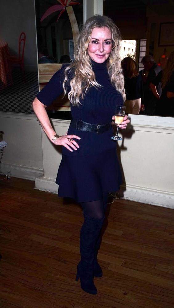 13P Carol Vorderman wearing Boots no.3