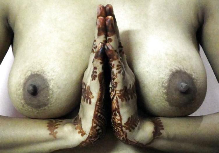 9P Indian newly wife with mehndi on hands