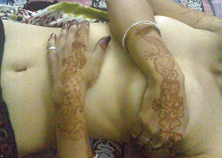 9P Indian newly wife with mehndi on hands