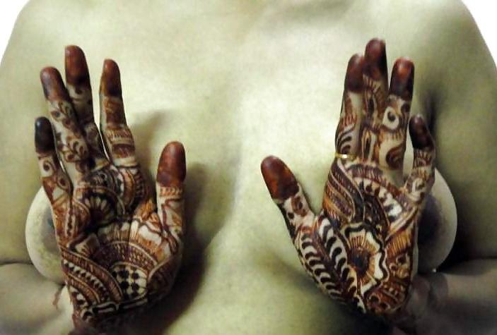 9P Indian newly wife with mehndi on hands