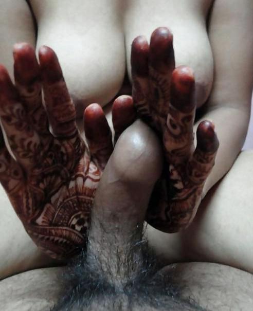 9P Indian newly wife with mehndi on hands