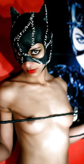 21P Indian chick in cat suit stripping
