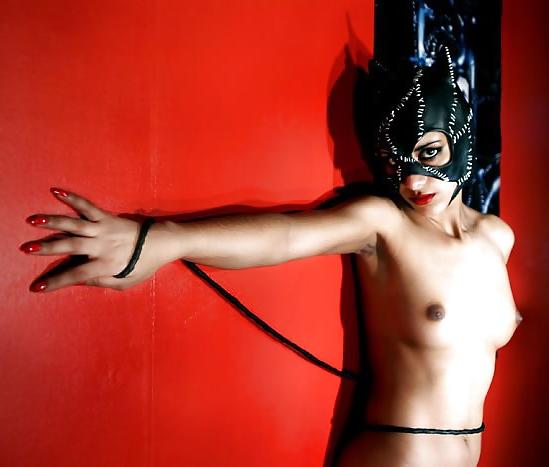 21P Indian chick in cat suit stripping