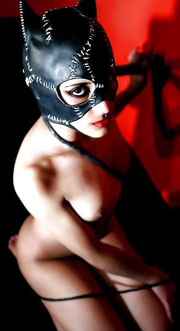 21P Indian chick in cat suit stripping