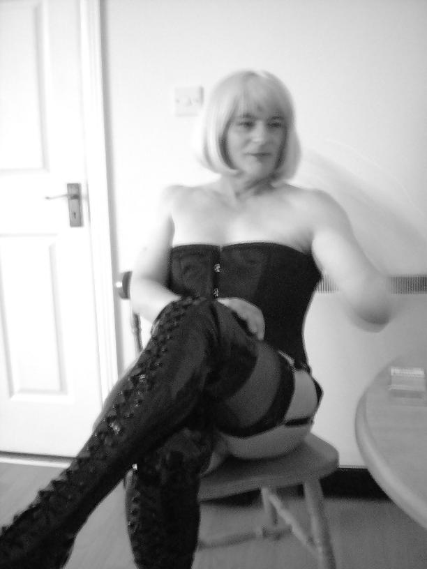 11P Boots...Corset and smoking