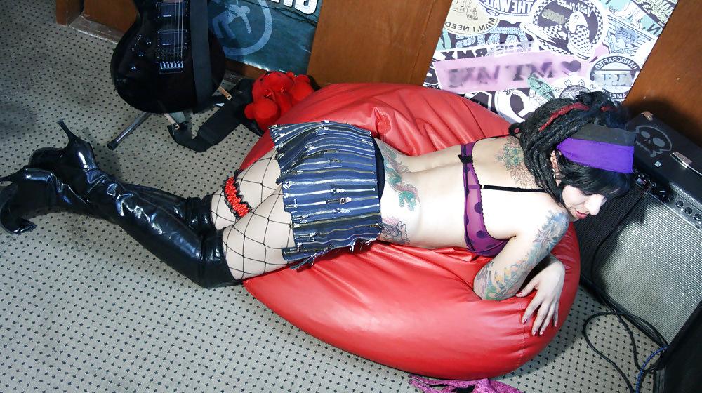 14P Cute brunette with sexy kinky boots & fishnets