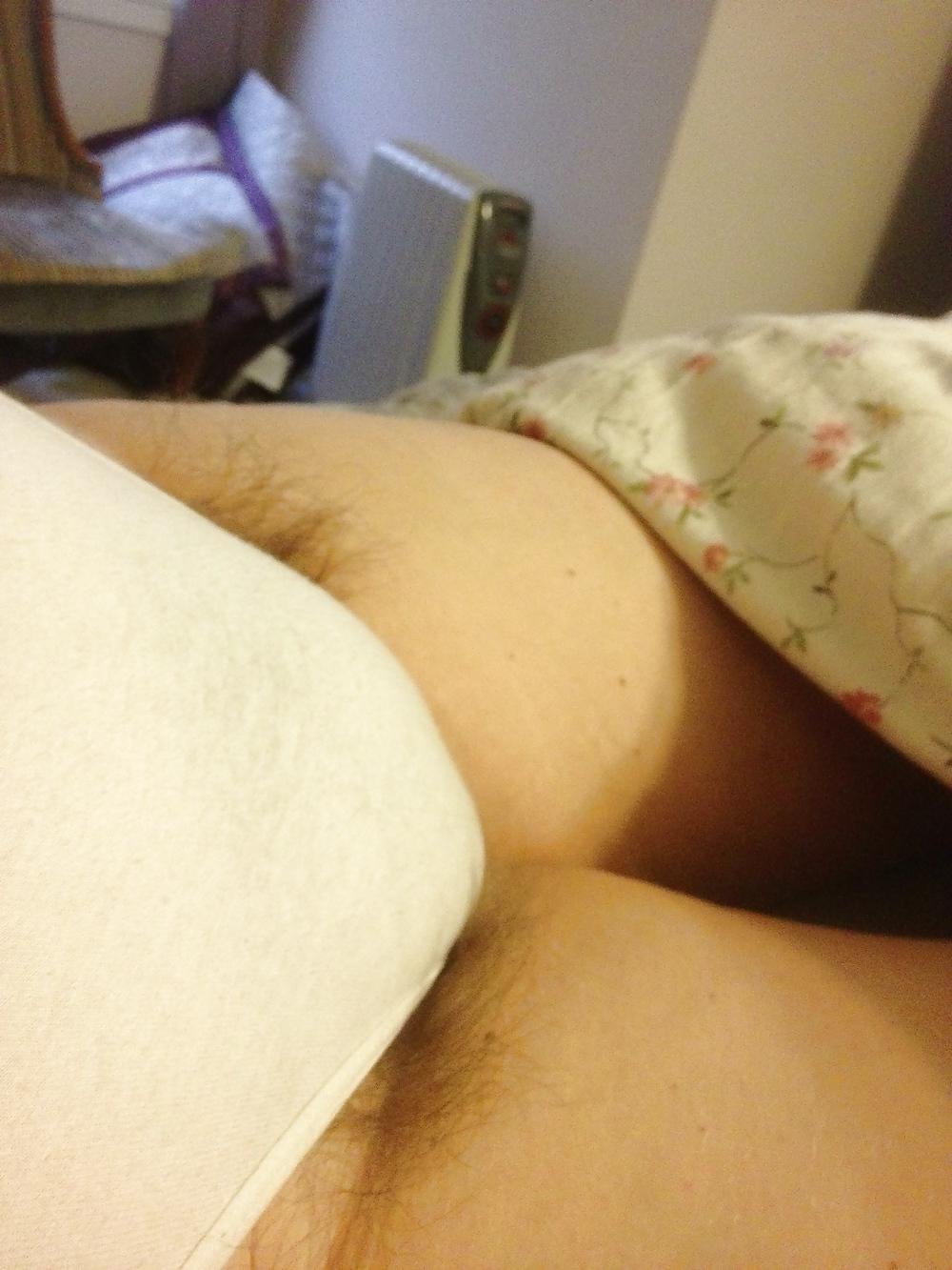 25P Her hairy pussy, pitts & big titts.